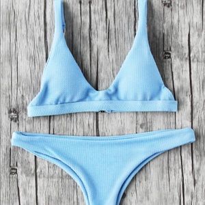 Light blue bikini (top and bottoms)